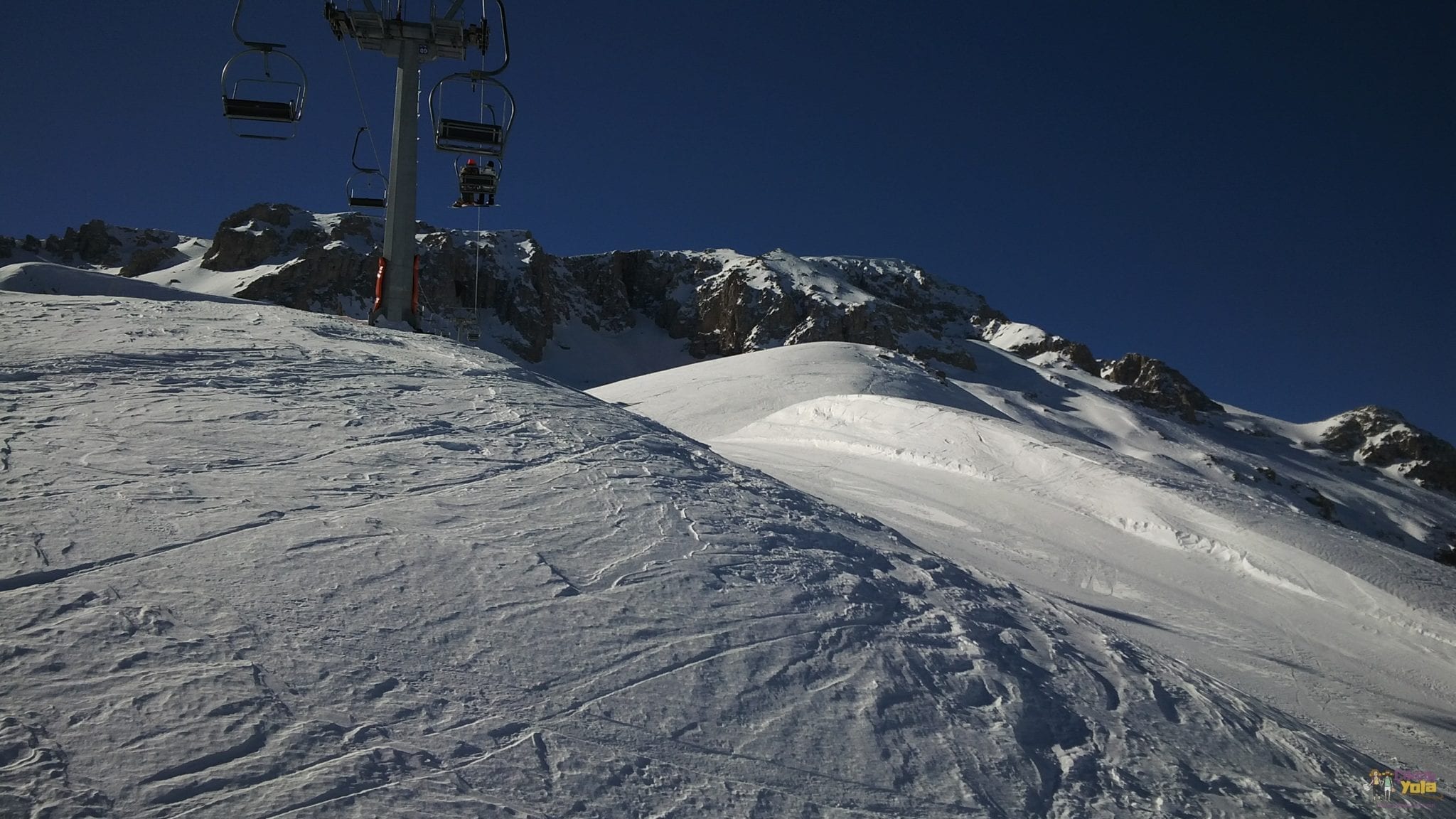 Snowy ski slope and chairlift at Davraz Ski Resort